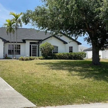 Rent this 3 bed house on 3807 Southwest 15th Place in Cape Coral, FL 33914