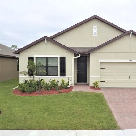 Rent this 4 bed house on unnamed road in Palm Bay, FL 32909