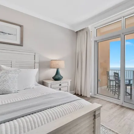 Rent this 4 bed condo on Orange Beach