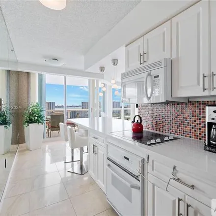 Rent this 2 bed apartment on 16400 Collins Ave