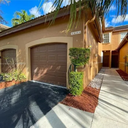 Rent this 3 bed townhouse on 1434 Coronado Road in Weston, FL 33327