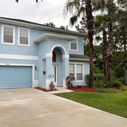 Buy this 4 bed house on 9018 Edenshire Circle in Orange County, FL 32836
