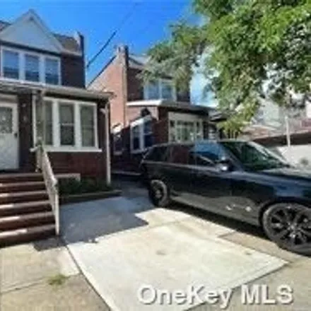 Buy this 3 bed house on 130-14 117th Street in New York, NY 11420