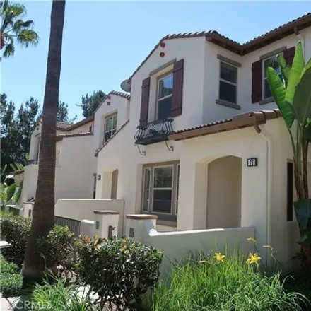 Rent this 3 bed house on 76-82 Hedge Bloom in Irvine, CA 92618