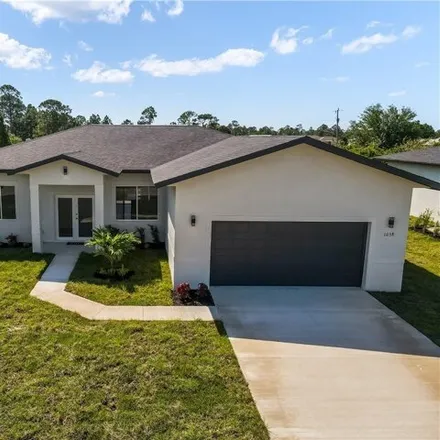 Image 4 - 1038 Capetown Ave, Lehigh Acres, Florida, 33974 - House for sale