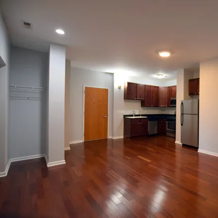Rent this 2 bed apartment on 2451 W Howard St