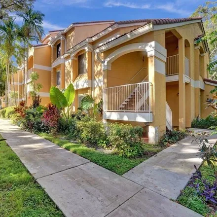 Buy this 2 bed condo on 2421 Northwest 33rd Street in Royal Palm Isles, Broward County