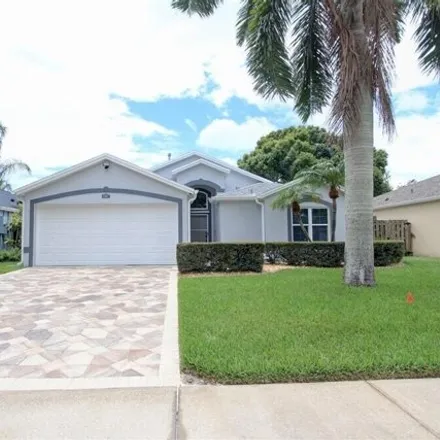 Rent this 3 bed house on 6987 Hammock Trace Dr in Melbourne, Florida