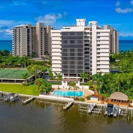 Rent this 3 bed condo on Gulfshore Drive in Pelican Bay, FL 34108