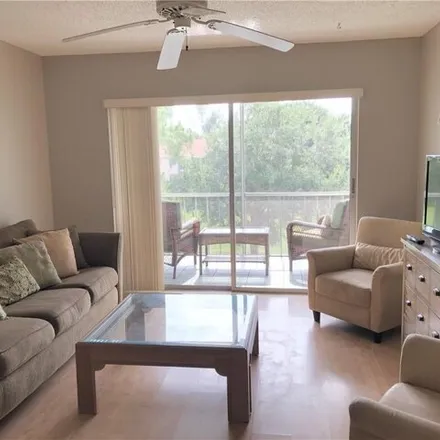 Rent this 1 bed condo on 323 Turtle Lake Court in Collier County, FL 34105