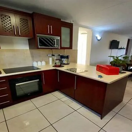 Rent this 4 bed apartment on Benoni Central Methodist in Cranbourne Avenue, Kleinfontein Lake
