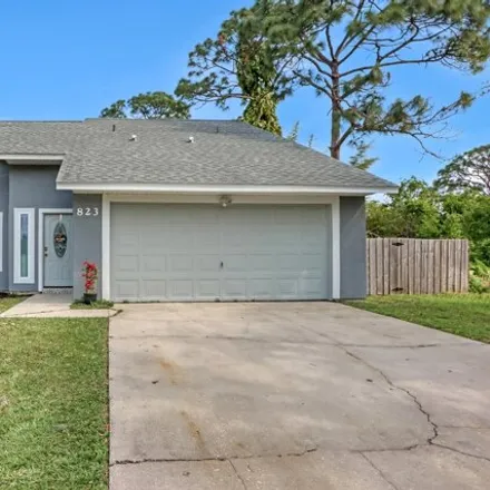 Buy this 4 bed house on 827 Thuringer Street Northwest in Palm Bay, FL 32907