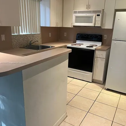 Rent this 3 bed apartment on 7766 Northwest 22nd Street in Pembroke Pines, FL 33024