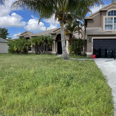 Buy this 3 bed house on 6859 Northwest Dragon Street in Port Saint Lucie, FL 34983