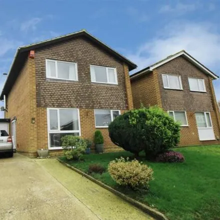Rent this 4 bed house on Lingfield Drive in Pound Hill, RH10 7XQ