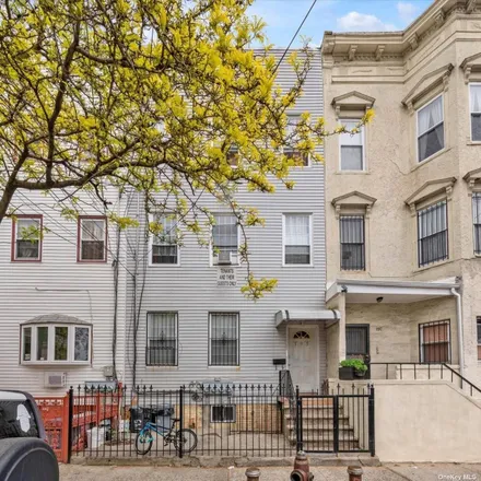 Buy this 11 bed townhouse on 197 Sheridan Avenue in New York, NY 11208