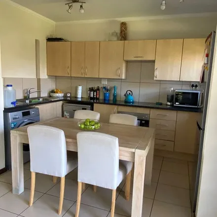 Rent this 2 bed townhouse on Jackal Creek Golf Estate in Johannesburg Ward 114, Roodepoort