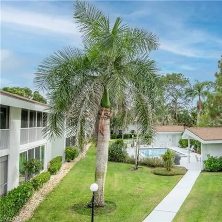 Rent this 2 bed condo on 4126 Belair Ln Apt C3 in Naples, Florida