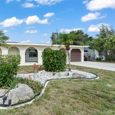 Buy this 3 bed house on 174 Herron Drive in South Patrick Shores, Brevard County