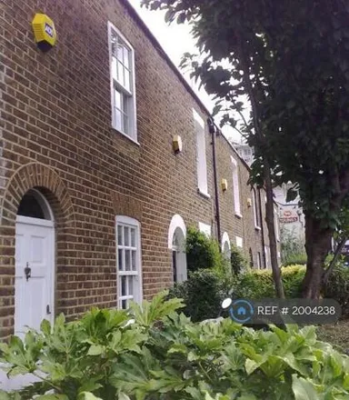 Rent this 2 bed townhouse on 22 Barchard Street in London, SW18 1DU