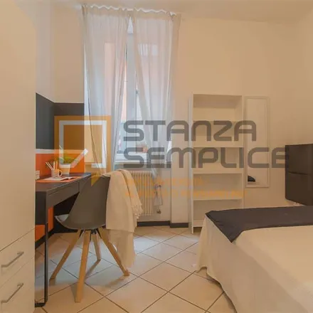 Rent this 4 bed room on Salone Renato in Largo Nazario Sauro, 15