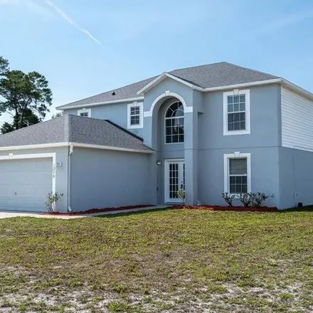 Rent this 4 bed apartment on 1279 Anderson Street in Deltona, FL 32725