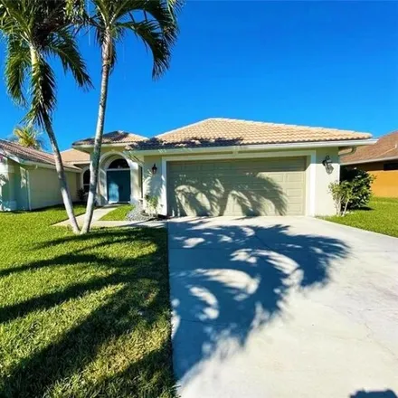 Rent this 4 bed house on 271 Sawgrass Court in Willoughby Acres, Collier County