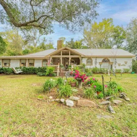 Buy this 4 bed house on 265 Morphy Avenue in Magnolia Beach, Fairhope