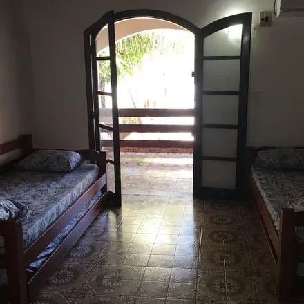 Rent this 4 bed house on Arraial do Cabo in Região Geográfica Intermediária de Macaé-Rio das Ostras-Cabo Frio, Brazil