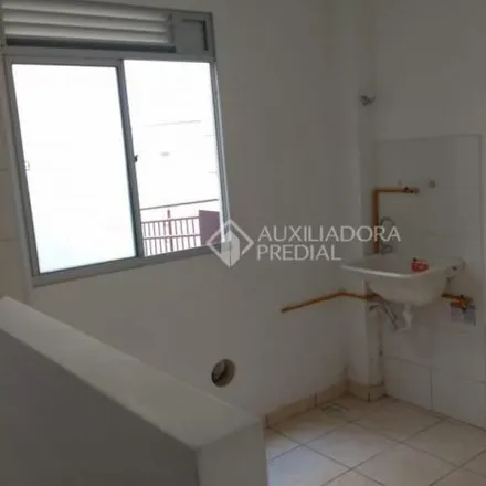 Buy this 2 bed apartment on Playgroud Infantil II - Praça Amaro Falero in Rua Guarujá, São José