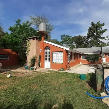 Buy this 4 bed house on Pueblos Aborígenes in Partido de Brandsen, 1984 Barrio Parque Las Acacias