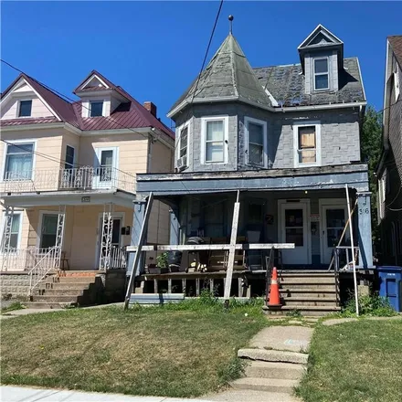 Buy this 4 bed apartment on 318 Herkimer Street in Buffalo, NY 14213