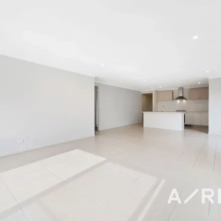 Rent this 4 bed apartment on Aspera Drive in Werribee VIC 3030, Australia