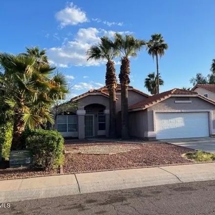 Rent this 4 bed house on 3519 East Oraibi Drive in Phoenix, AZ 85050