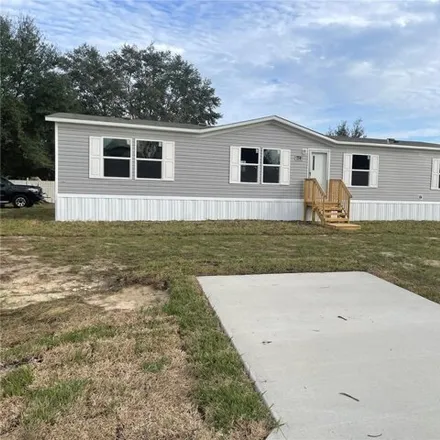 Buy this studio apartment on 8411 Southwest 65th Terrace in Marion County, FL 34476