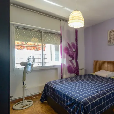 Rent this 3 bed room on Calle de Camarena in 158, 28047 Madrid