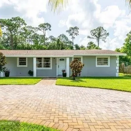 Buy this 5 bed house on 318 Forest Estate Drive in West Palm Beach Farms, Palm Beach County