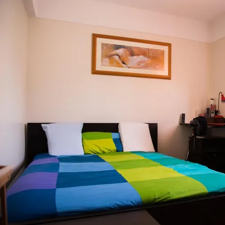 Rent this 5 bed room on Rua Eduardo Viana in 1500-450 Lisbon, Portugal