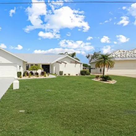 Rent this 3 bed house on 1475 Blue Lake Circle in Charlotte County, FL 33983
