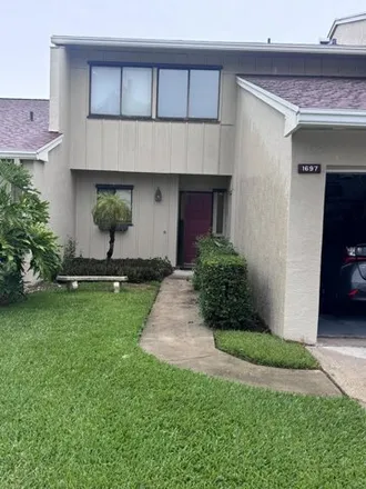 Rent this 2 bed house on 1697 SW Crossing Cir in Palm City, Florida