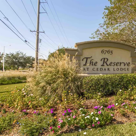 Buy this 1 bed townhouse on The Reserve at Cedar Lodge in 6765 Corporate Boulevard, Bocage