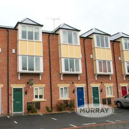 Rent this 3 bed townhouse on Dawson Court in Oakham, LE15 6SD