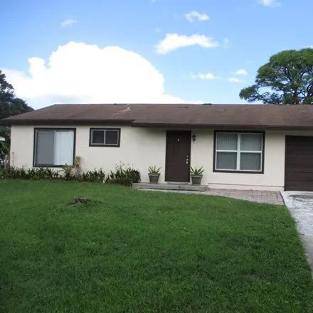 Buy this 2 bed house on 263 Southwest Homeland Road in Port Saint Lucie, FL 34953