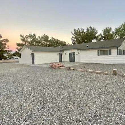 Buy this 3 bed house on 2481 East Falcon Street in Pahrump, NV 89048