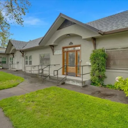 Buy this 5 bed house on Turlock Public Library in 550 North Minaret Avenue, Turlock