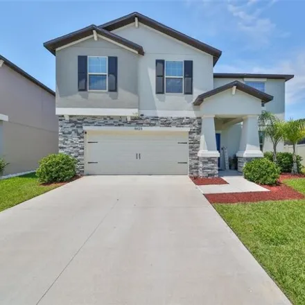 Buy this 6 bed house on 8829 Parsons Hill Blvd in Wesley Chapel, Florida