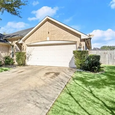 Rent this 4 bed house on 1498 Sand Lake Court in Fort Bend County, TX 77407