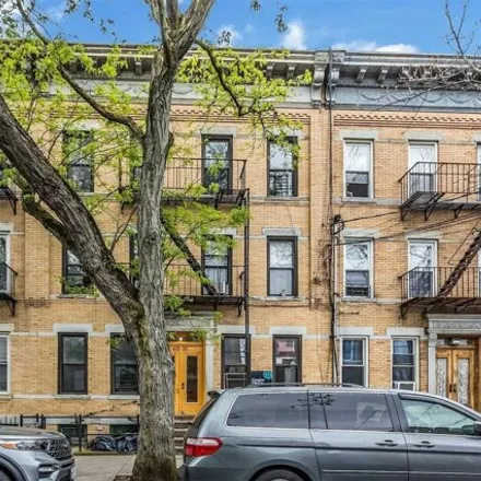 Buy this 12 bed house on 60-16 Woodbine Street in New York, NY 11385