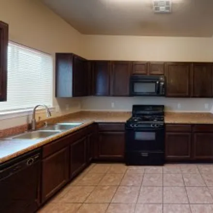 Buy this 4 bed apartment on 6978 Texas Oak Drive in Palomino, El Paso