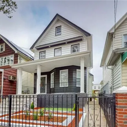 Buy this 5 bed house on 1055 East 93rd Street in New York, NY 11236